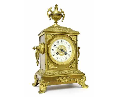 French brass two train mantel clock, the Japy Freres movement with outside countwheel striking on a bell, the 4" cream dial w