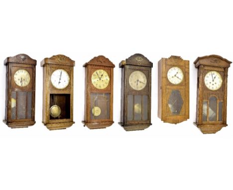 Oak three train wall clock striking on seven rods, the 7.5" silvered dial signed Bickerton & Son, Stourport, within an oak ca