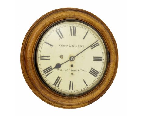 Oak single fusee 12" wall dial clock signed Kemp & Wilcox, Wolverhampton, within a turned surround (pendulum and key)