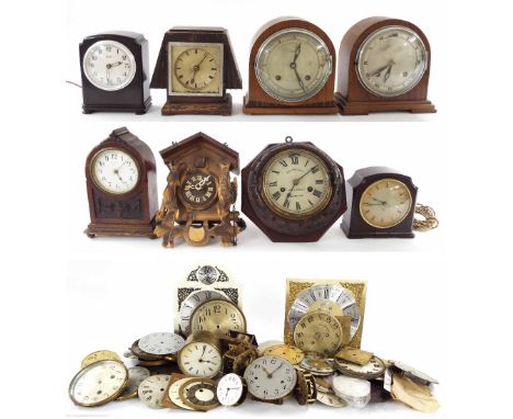 Eight various wooden and Bakelite cased small clocks; also a small quantity of part clocks and clock movements etc
