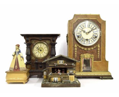 Walnut inlaid three train automaton mantel clock, 17.5" high (in need of restoration and assembly); also a German musical man