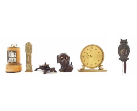 Cylindrical brass ticket clock within a shagreen stepped case, 7" high; also five other small novelty clocks (6)
