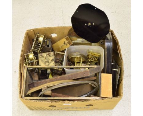 Box of part movements and clock spares,  including bezels and locks etc