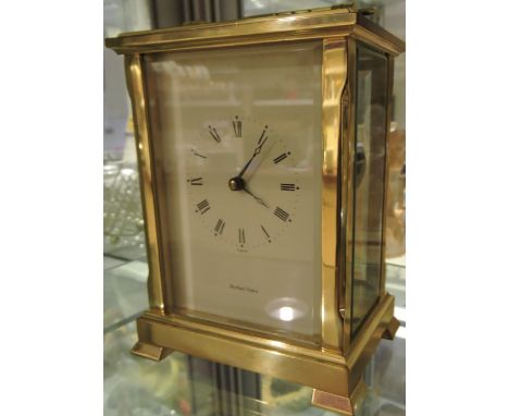 A good quality modern brass carriage clock with rectangular Roman numeral dial marked Shortland Bowen, h:15cm