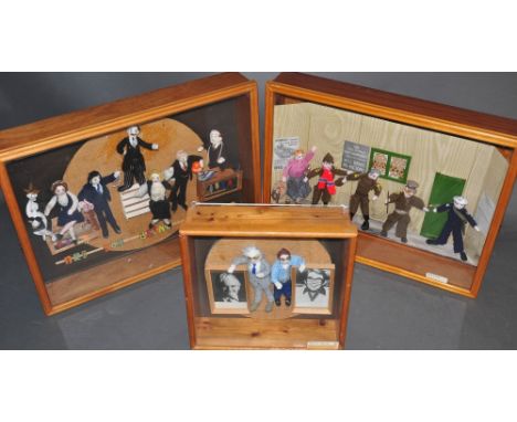 A hand-knitted figural group, the cast of the popular 1970s television series Are You Being Served?, with pine display case, 