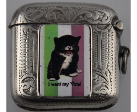 A silver and enamel set vesta case with a suffragette motif