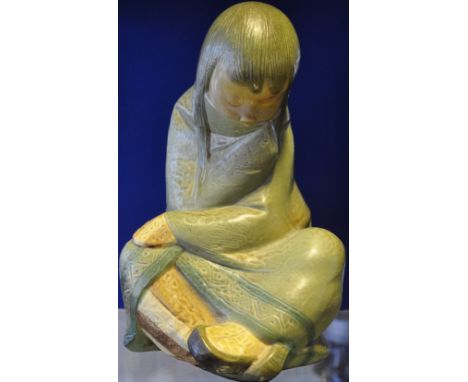 A Lladro figure of an Inuit girl. H. 30cm