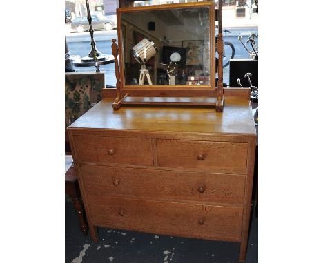 A vintage Heals light oak four drawer chest on square moulded feet, w:91cm, together with a similar light oak toilet mirror