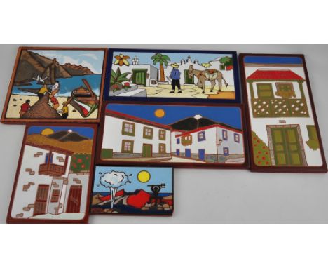 A collection of six Meditteranean glazed ceramic wall plaques, largest 19.5 x 19.5cm