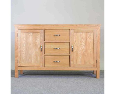 A modern light oak sideboard137w x 47d x 85h cm