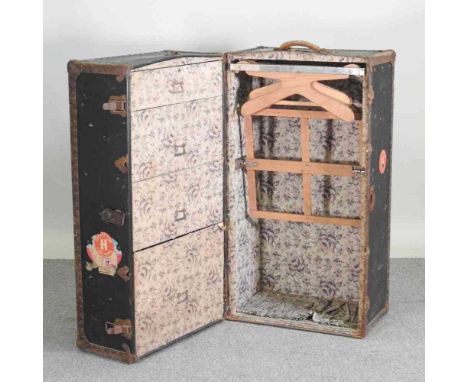 An early 20th century travelling trunk, with a fitted interior105w x 57d x 60h cm