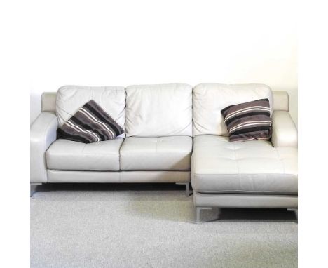 A modern grey leather upholstered corner sofa, on metal legs, with loose cushions220w x 165w x 80h cm