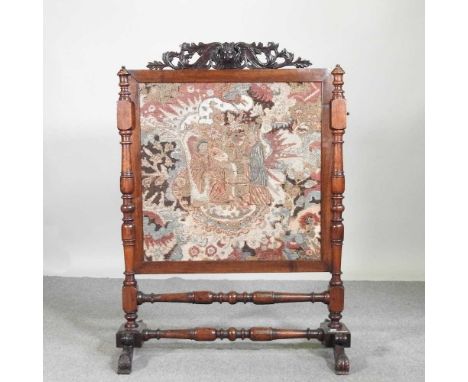 A Victorian mahogany fire screen, inset with a Chinese tapestry81w x 37d x 111h cm