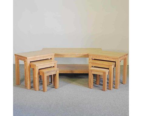 A modern light oak coffee table, together with a nest of three occasional tables and another (7)115w x 55d x 48h cm