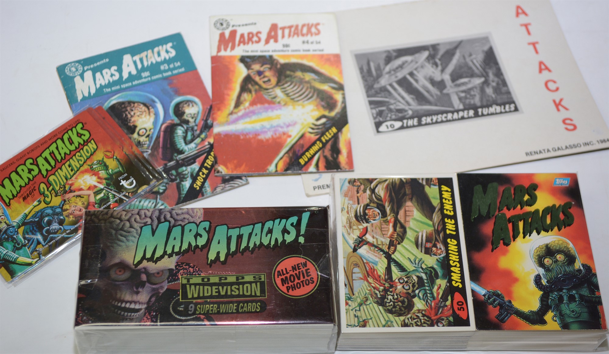 Mars Attacks cards by Topps, 1994 and 2012 (thee 3dimentional); two
