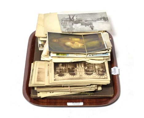 A collection of postcards and vintage photographs including view of old Egypt and Israel together with other British postcard