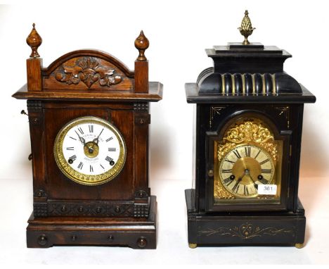 'Fattorini &amp; Sons, Bradford' mantel clock and a striking ebonised mantel clock (2)