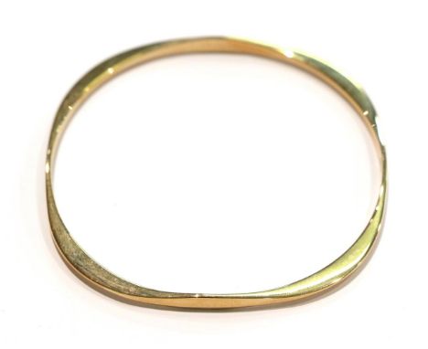 A 9 carat gold bangle, internal diameter 6.5cm .  Gross weight 12.9 grams. 