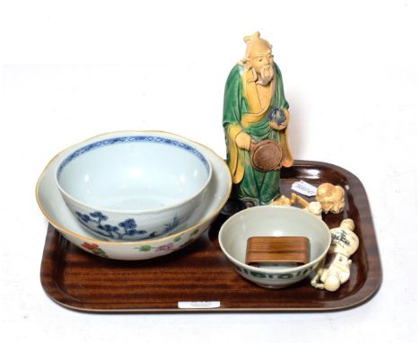 A Chinese tea bowl marked from Tek Sing Treasures together with a blue and white bowl from Nanking Cargo sale, a collection o