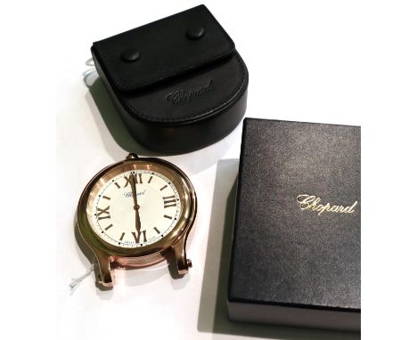 A travelling/desk timepiece, signed Chopard, model: Happy Sport, circa 2015, quartz movement, silvered dial with Roman numera