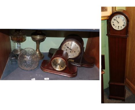 A small chiming Art Deco longcase clock together with a chiming Art Deco mantel clock, striking mantel clock and two oil lamp