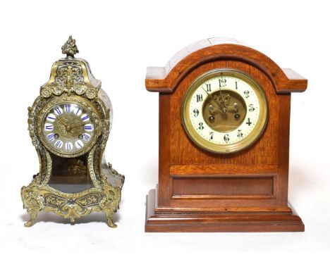 A mahogany mantel clock with visible Brocot escapement; and a small 'Boulle' work striking mantel clock 