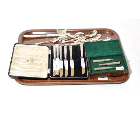 A set of six silver-handled butter knives, Viners of Sheffield; a set of twelve silver tea and a further set of six, various 
