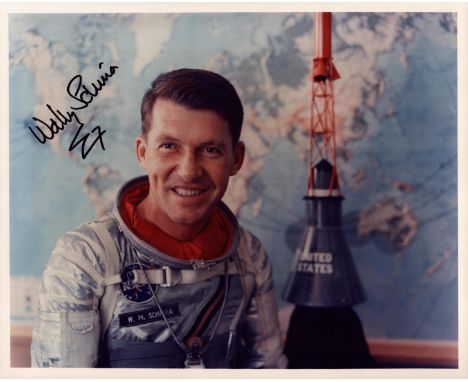 Wally Schirra signed 10x8 inch colour photo pictured in Space suit. Good condition. All autographs come with a Certificate of