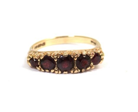 9ct Yellow Gold Ring set with Five Garnets.  Finger size 'O'    2.9g
