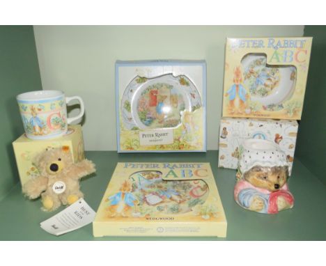 Selection of Wedgwood Peter Rabbit ceramics all appear to be unused in the boxes plus a mini Stieff bear key ring.