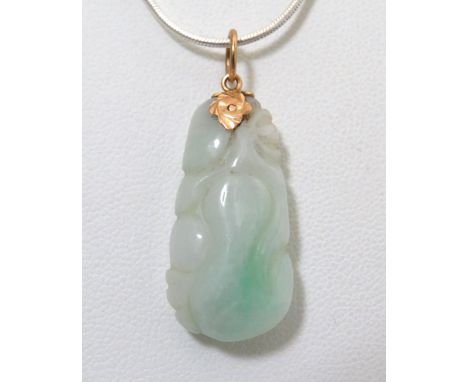38mm Jade Pendant set upon a 22ct Yellow Gold Mount. 