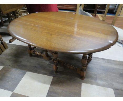 Ercol Drop Leaf Coffee Table of good colour in good conditon H:19 x W:42 .  See photos. 
