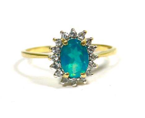 9ct Yellow Gold Ring set with Rhodolite Lab created Blue/Green Opal.  Finger size 'N'  1.9g