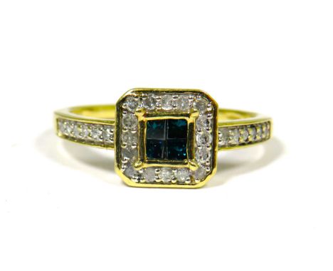9ct Yellow Gold Ring set with Four Central Blue/Green Diamonds with Diamond Surround and Diamond set shoulders.  Finger size 