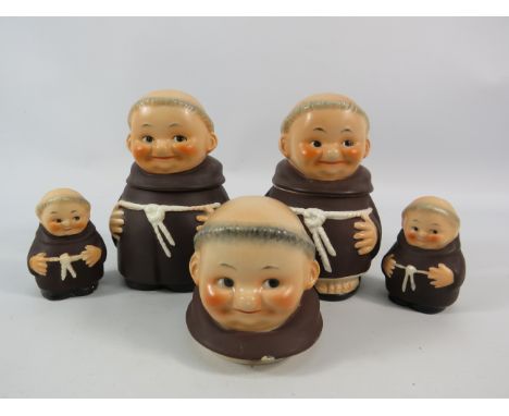 Two Goebel Hummel lidded monk pots plus monk salt and pepper pots and a spare monk head.