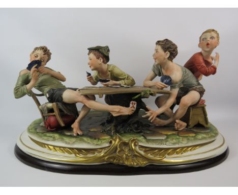 Very Large Bruno Merli Capodimonte figural group " The Card Cheats ".  23" long and 12" tall. Please note this item is very h