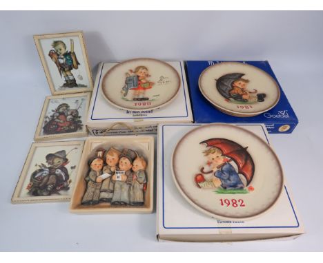 Three Goebel Hummel christmas plates, a wall plaque and Three framed prints.