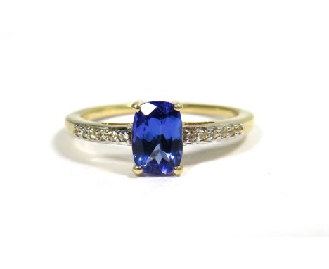 9ct Yellow Gold Ring set with a Deep Blue Gemstone and CZ Shoulders.  Finger size 'L'   1.7g