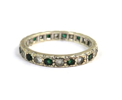 9ct White Gold Eternity ring set with Green and clear gemstones. Finger size 'N-5'   2.0g