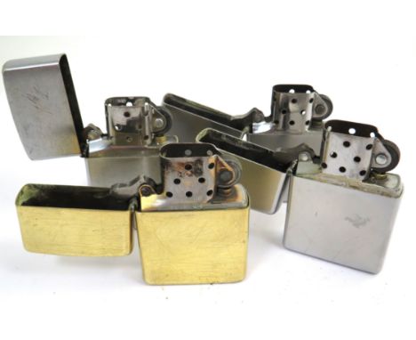 Four Lighters. Marked 'Zippo' see photos. 