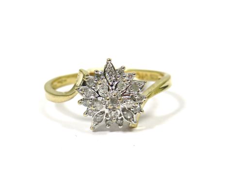 9ct Yellow Gold Ring set with Diamonds in a Flower pattern. 0.15pts of Diamonds. Finger size  P    2.2g