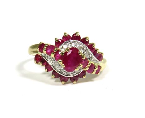 9ct Yellow Gold Ring set with Rubies and Diamonds in a Swirl pattern.  Finger size 'O'   3.4g