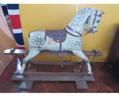 Late19th/Early 20th Century Dapple Grey Rocking horse on stained pine and metal rocker.  Horse is in unrestored and original 