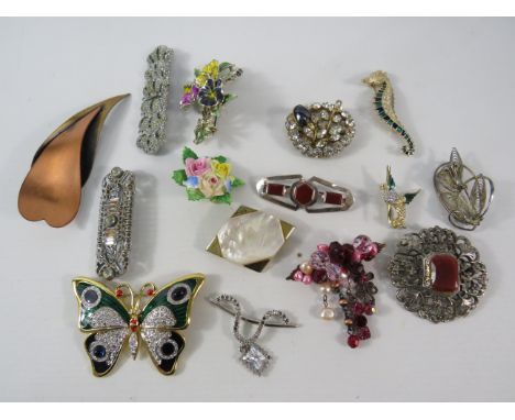 Selection of vintage brooch plus some modern enamel brooches.