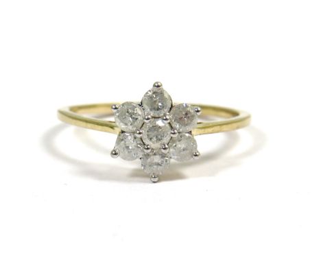 9ct Yellow Gold Ring set with Seven Diamonds in a Flower Pattern. Each Diamond approx 2.5mm.  Finger size L-5    1.3