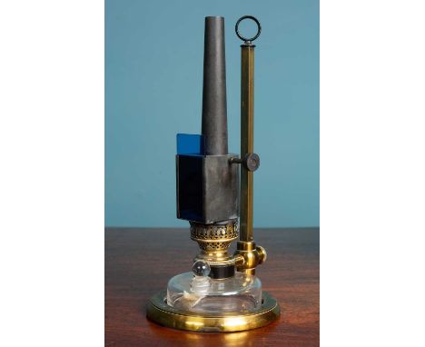 A 19th century cased microscope lamp by J Woolley &amp; Sons &amp; Co Limited, Victoria Bridge, Manchester, the adjustable la