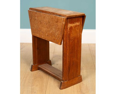A Cotswold school small oak drop-leaf table with angled leaves and shaped supports46cm wide x 20cm deep x 52.5cm highQty: 1Mi