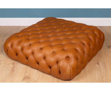 A contemporary leather, button-upholstered ottoman stoolapproximately 116cm square x&nbsp; approximately 34cm highIn generall
