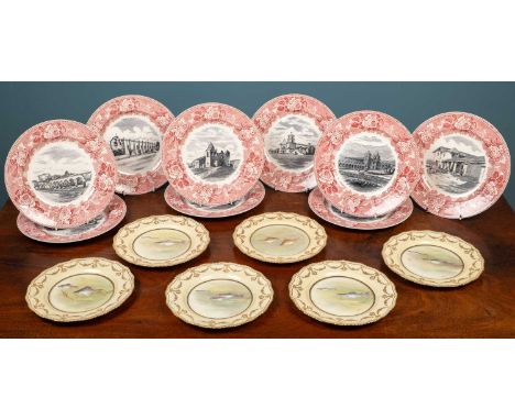 A set of six Doulton porcelain cabinet plates centrally decorated with fish painted by J Hallmark, each plate with raised gil