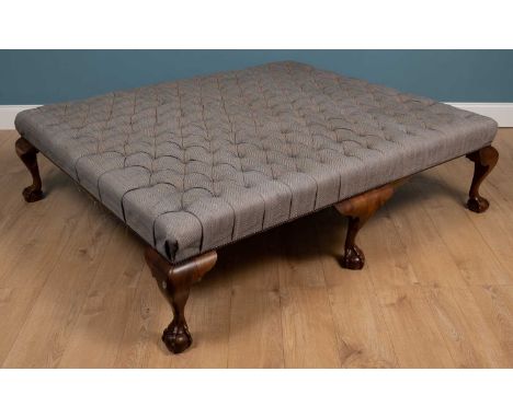 A large Country House button upholstered stool standing on six hardwood cabriole legs terminating in claw and ball feet190cm 